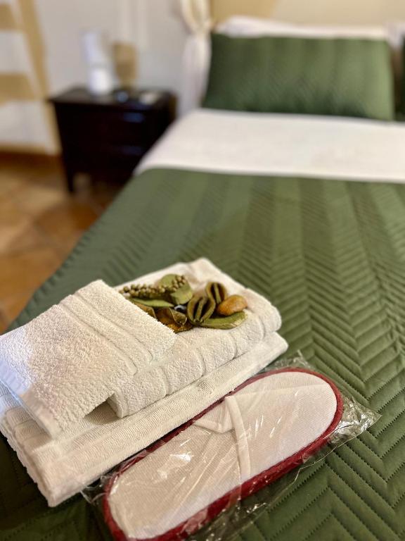 Postel nebo postele na pokoji v ubytování B&B Antico Caricatore