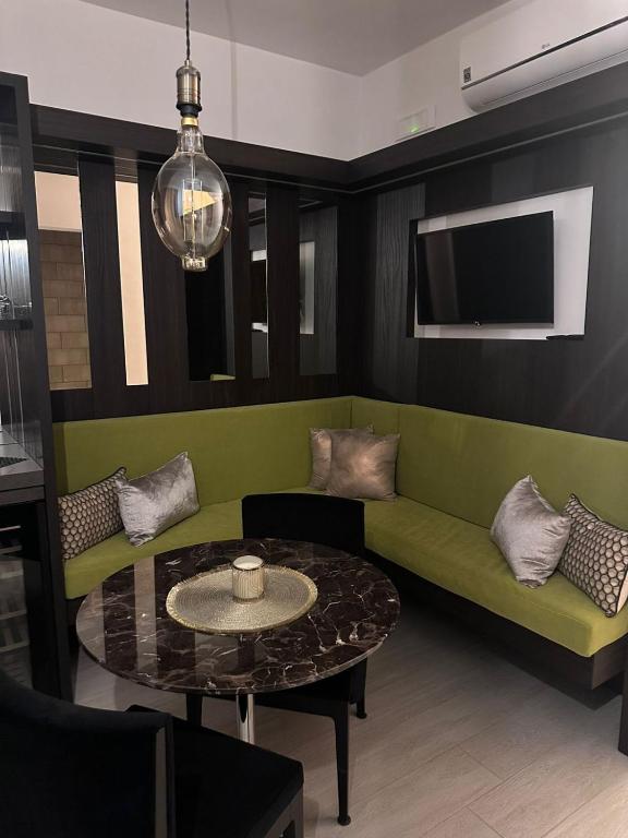 Posezení v ubytování Altamarea Rooms