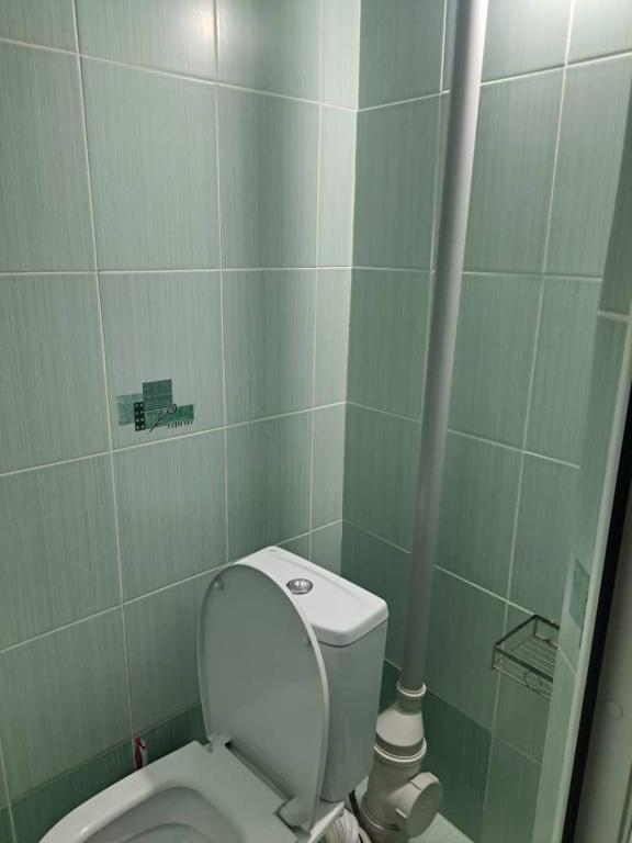 Koupelna v ubytování GuestHouse "ERKIN"