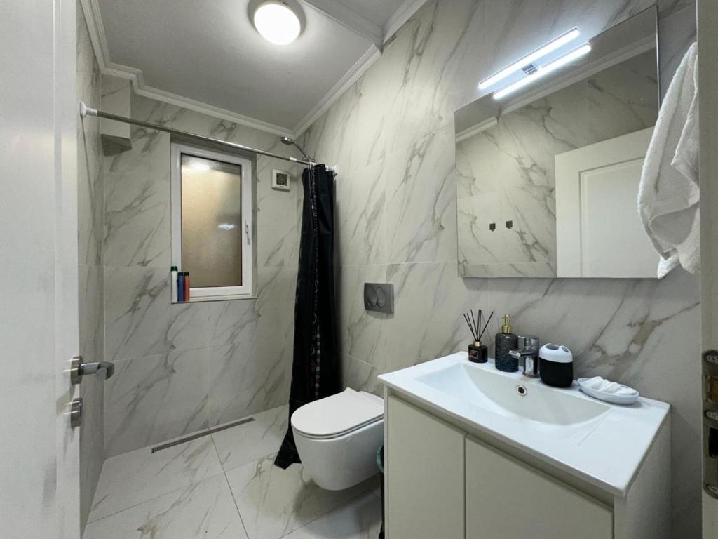 Koupelna v ubytování Center Luxury Rooms