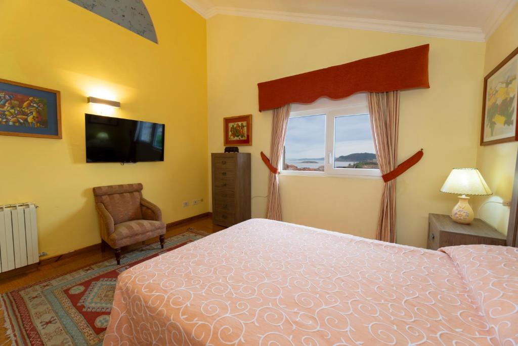 Telewizja i/lub zestaw kina domowego w obiekcie Casa Vila do mar