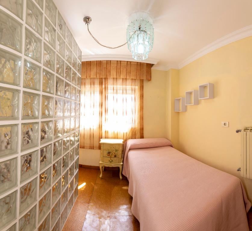Łóżko lub łóżka w pokoju w obiekcie Casa Vila do mar