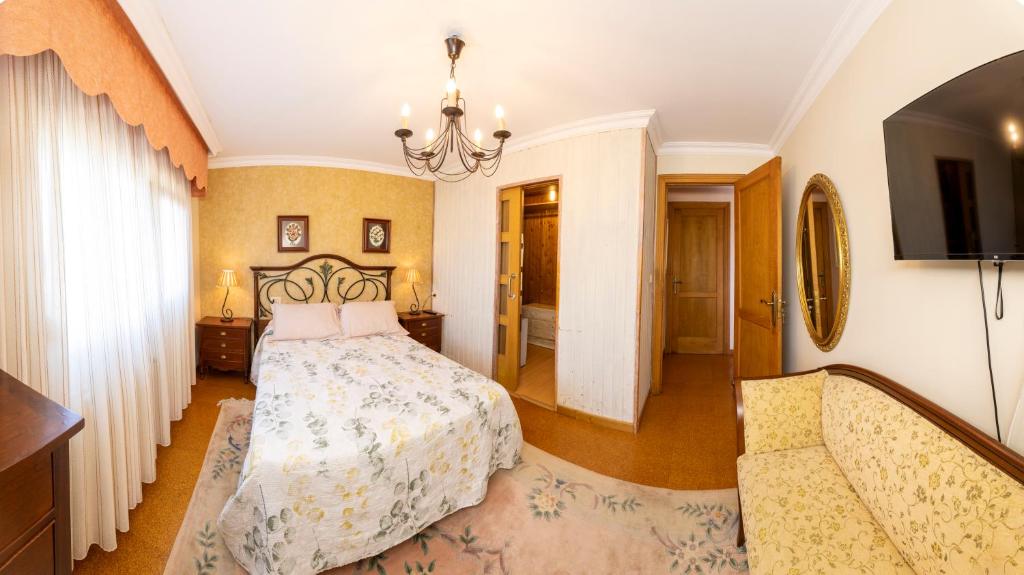 Łóżko lub łóżka w pokoju w obiekcie Casa Vila do mar