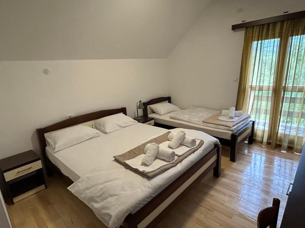 Postel nebo postele na pokoji v ubytování Vignjišta