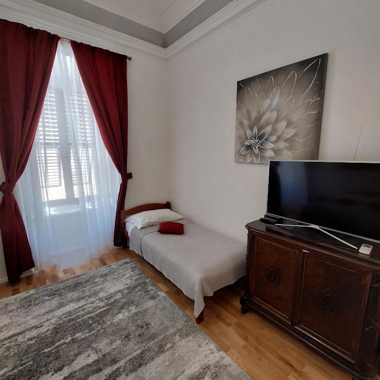 Televízia a/alebo spoločenská miestnosť v ubytovaní Dreams Stradun Apartments