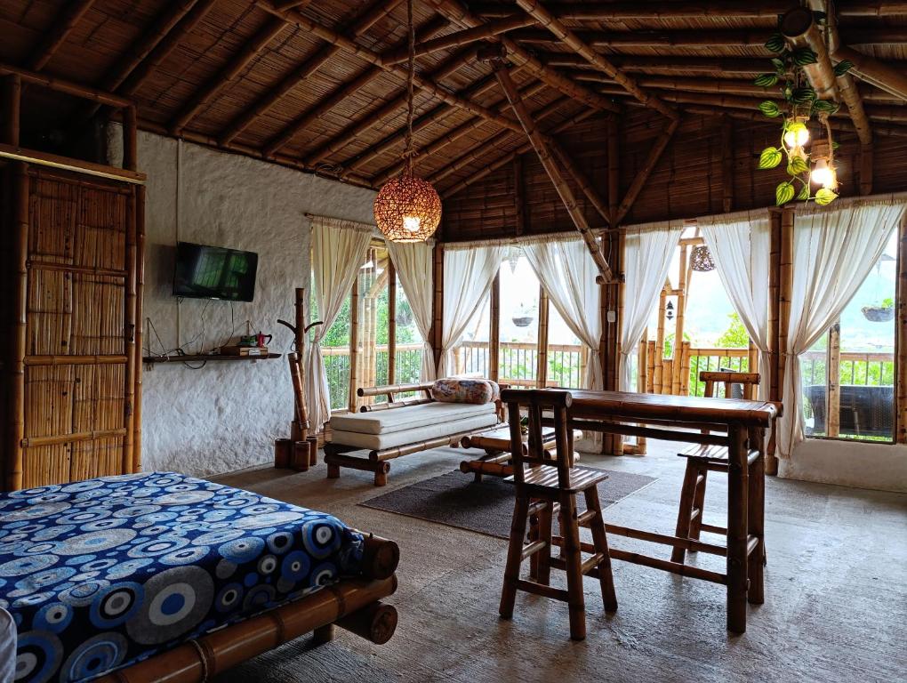 Postel nebo postele na pokoji v ubytování Cabaña El Ensueño