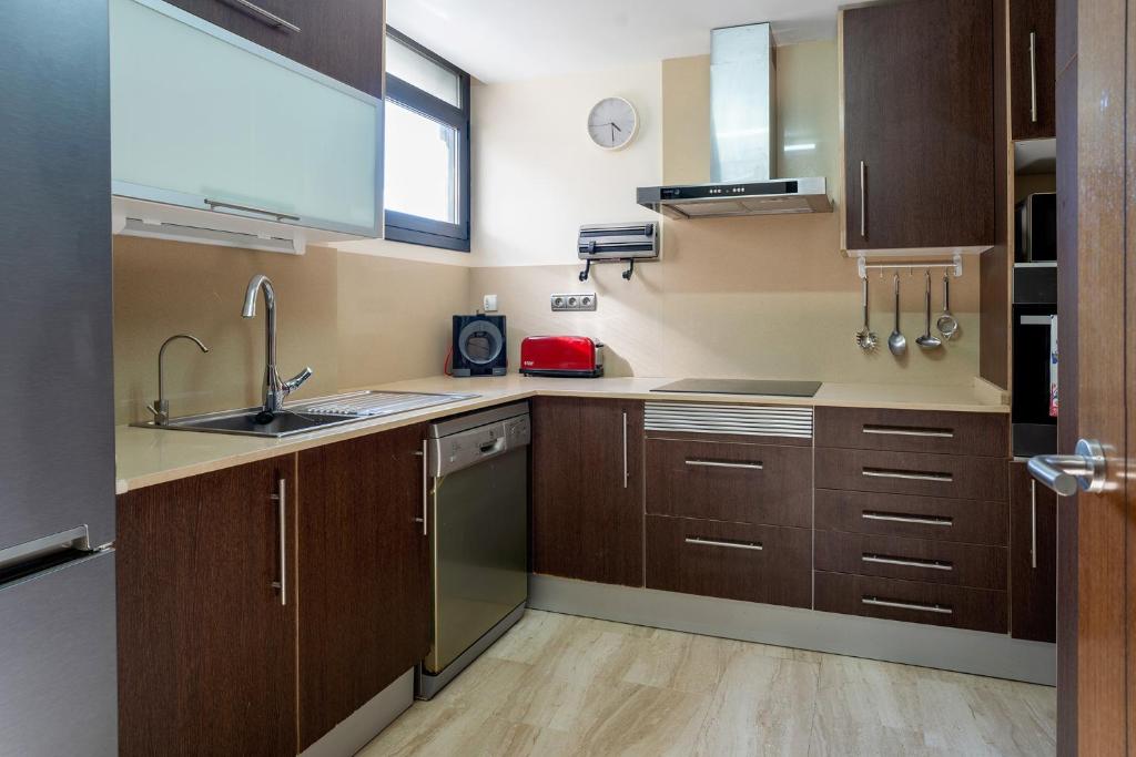 Kuchyňa alebo kuchynka v ubytovaní Apartamento Pepi