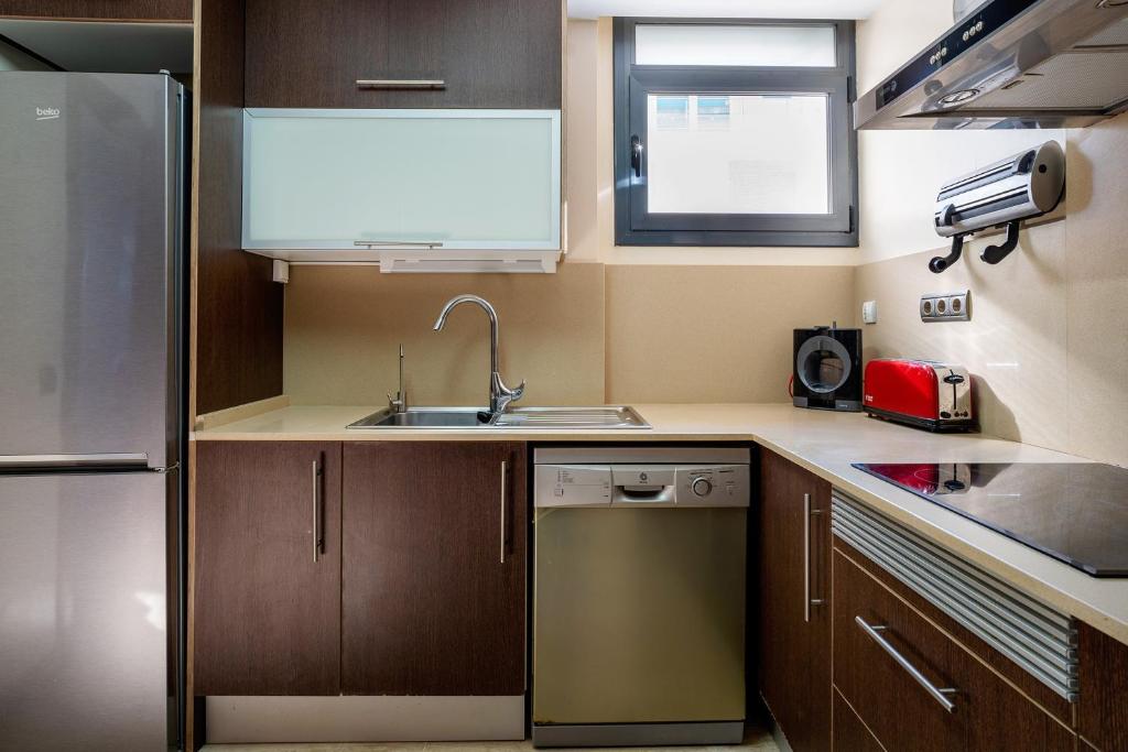 Kuchyňa alebo kuchynka v ubytovaní Apartamento Pepi