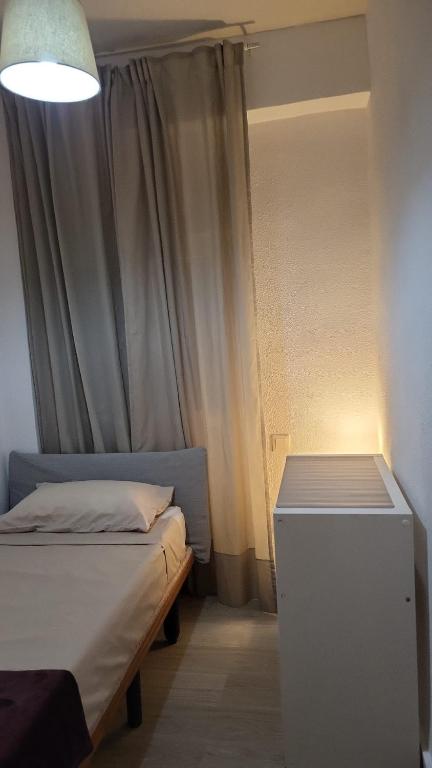 Postel nebo postele na pokoji v ubytování Cozy Flat