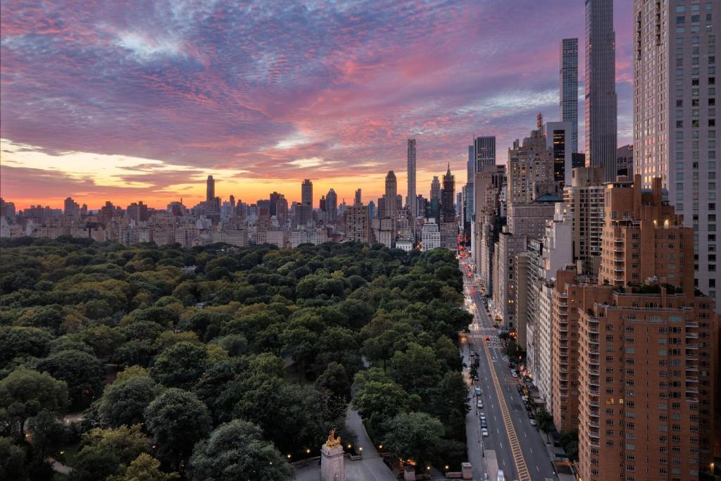 a view of a city skyline at sunset at Mandarin Oriental, New York in New York