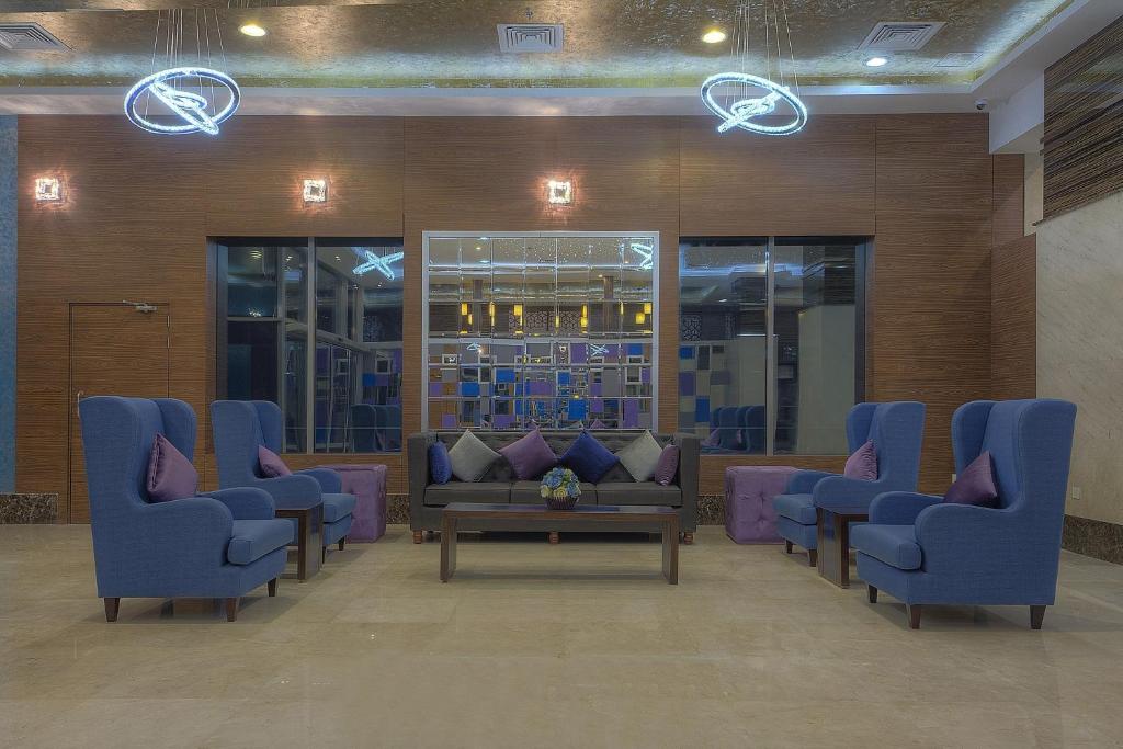 Zona d'estar a Orchid Vue Hotel
