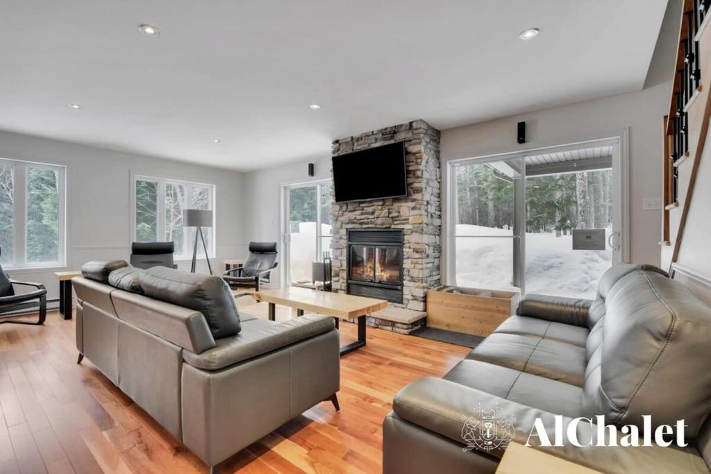 Le Refuge de la SainteMonique Boise avec spa, PetiteRivièreSaint