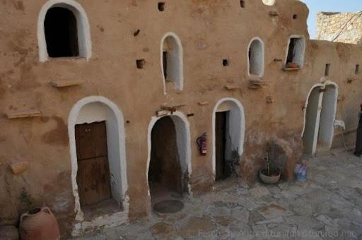 a building with a bunch of arches on it at Gite Douiret in Ad Duwayrāt