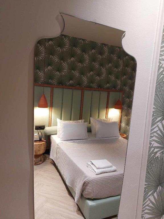 Postel nebo postele na pokoji v ubytování Hotel Coral