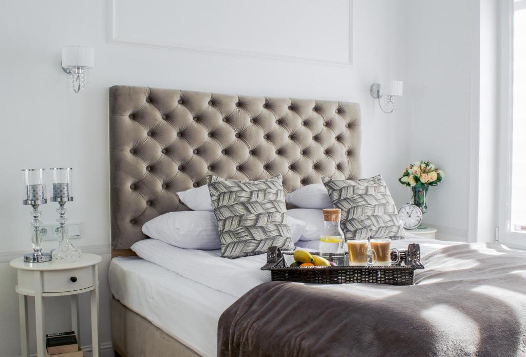 Posteľ alebo postele v izbe v ubytovaní Warsaw Seasons by Alluxe Boutique Apartments