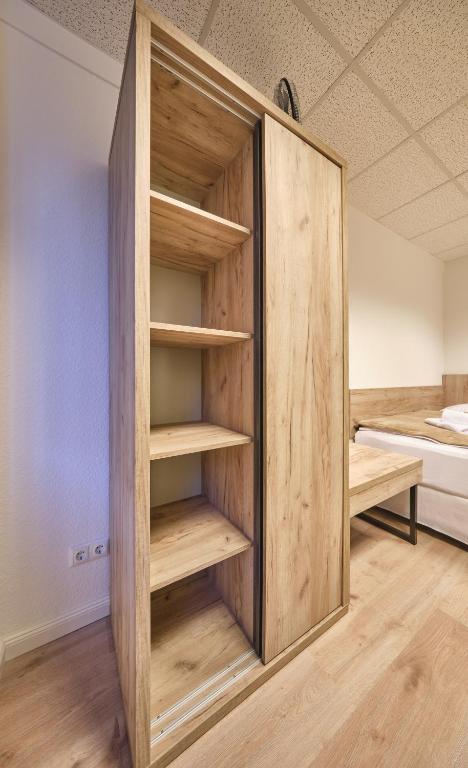 Postel nebo postele na pokoji v ubytování sleep1c