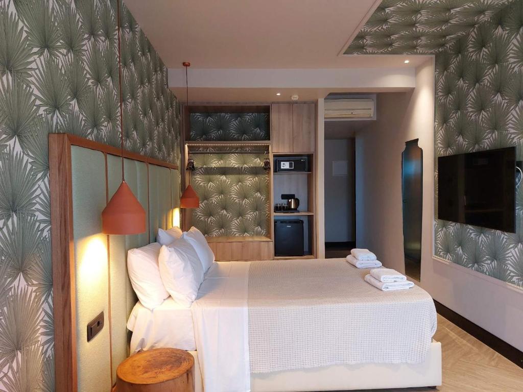 Postel nebo postele na pokoji v ubytování Hotel Coral