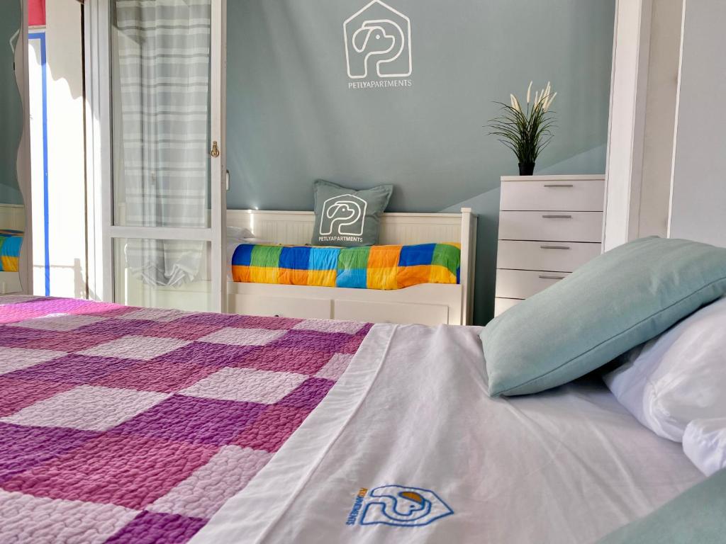 Posteľ alebo postele v izbe v ubytovaní La Casa di Pamy