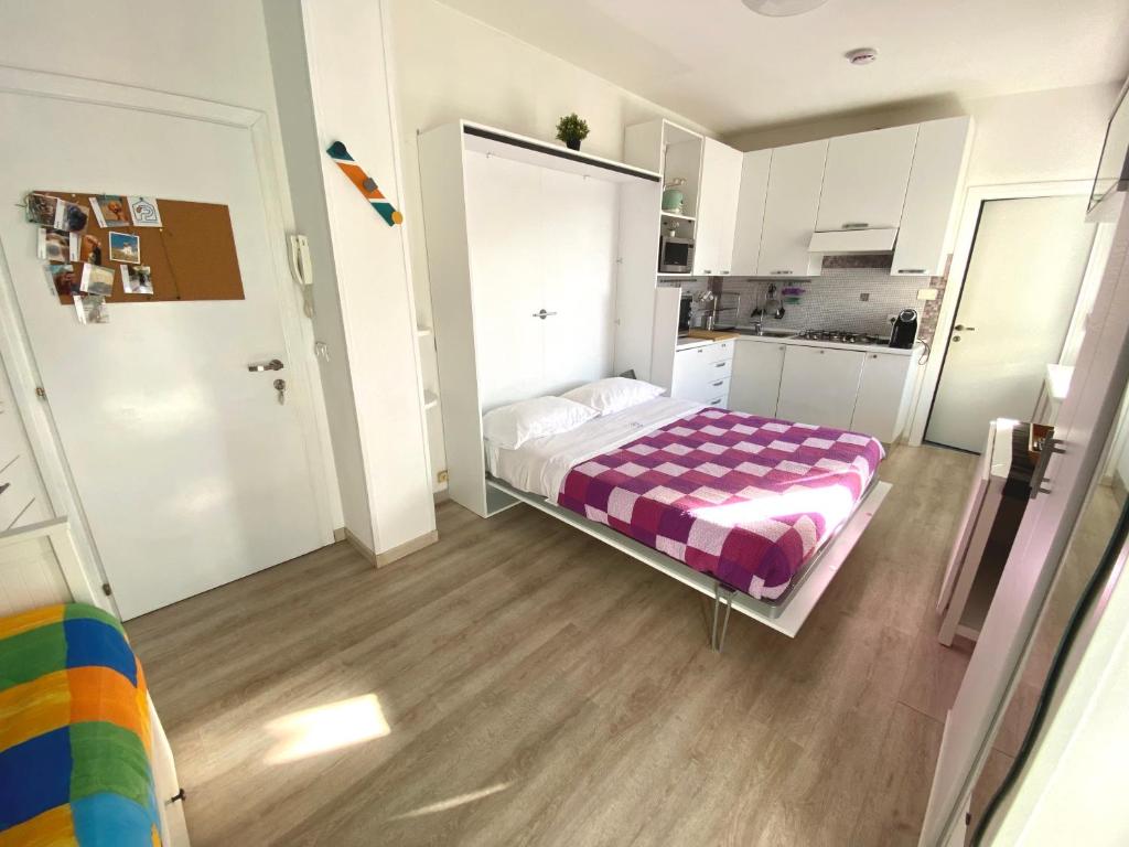Posteľ alebo postele v izbe v ubytovaní La Casa di Pamy