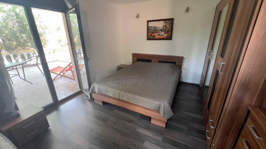 Postel nebo postele na pokoji v ubytování Apartments Arina