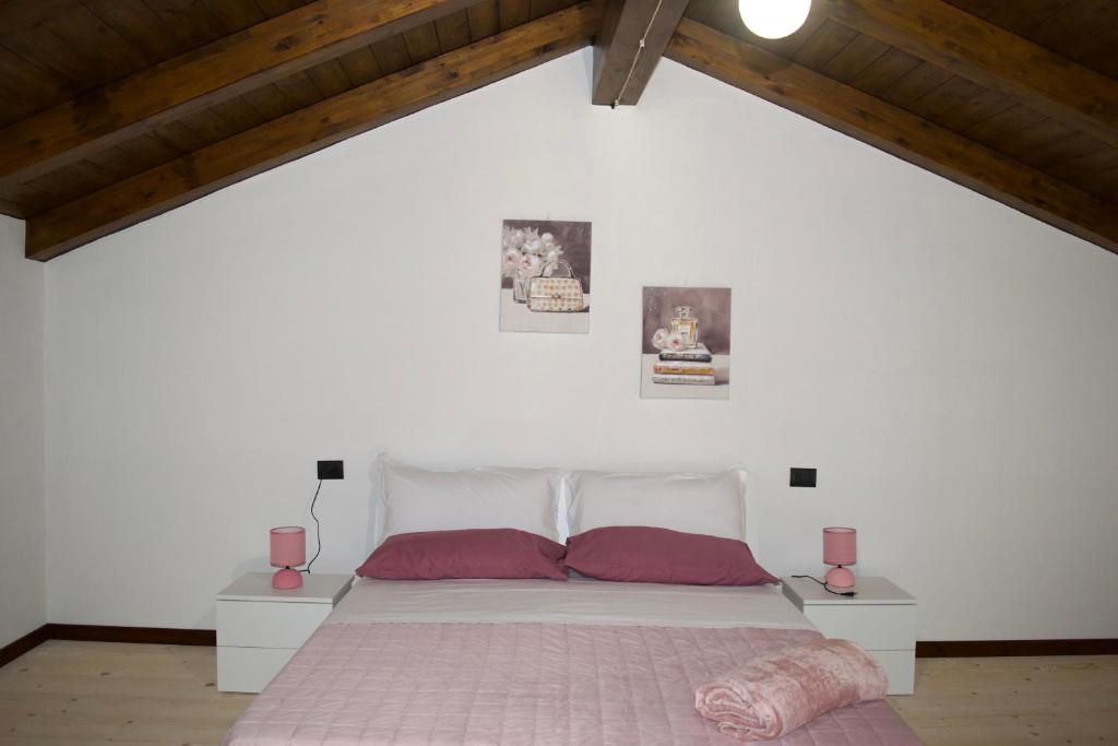 En eller flere senge i et værelse på IL CORTILE DELLE ZAGARE