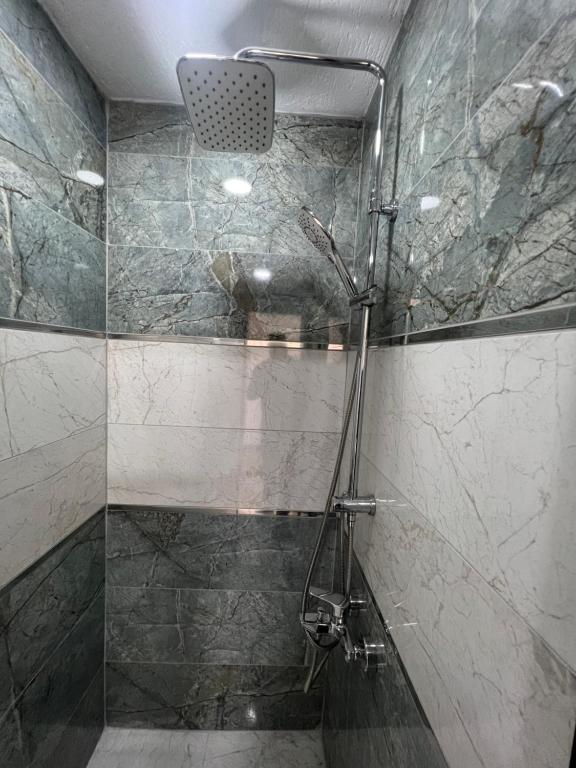 Koupelna v ubytování Feycem Suites Hotel