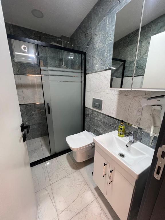 Koupelna v ubytování Feycem Suites Hotel
