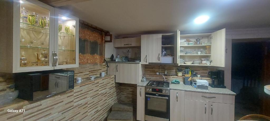 Kuchyň nebo kuchyňský kout v ubytování Eleven Guest House