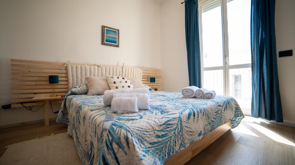 Postel nebo postele na pokoji v ubytování Casa Ri Mimmina