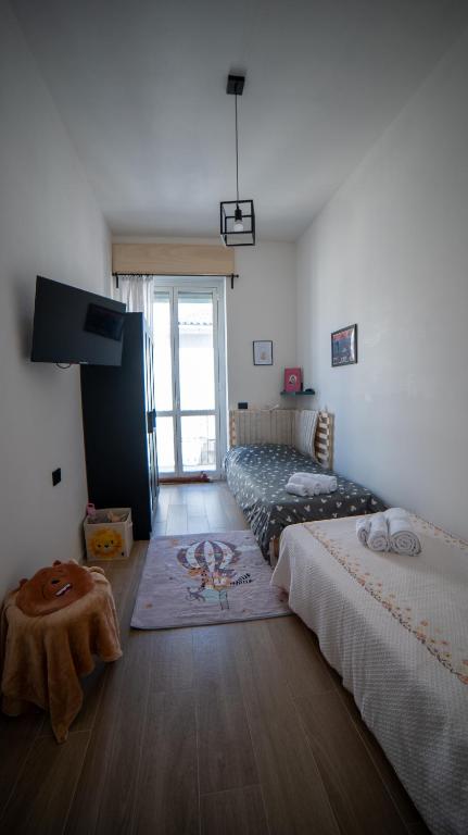 Postel nebo postele na pokoji v ubytování Casa Ri Mimmina