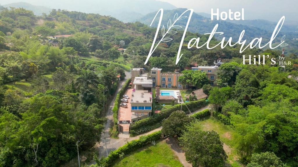 an aerial view of a resort in a forest at Hotel Natural Hill's by H&R in Villeta