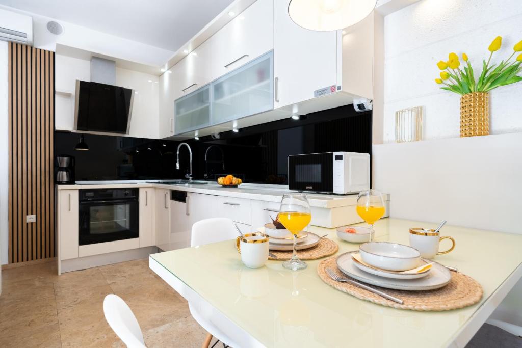 Kuchyň nebo kuchyňský kout v ubytování Premium apartment ALBA ROSA
