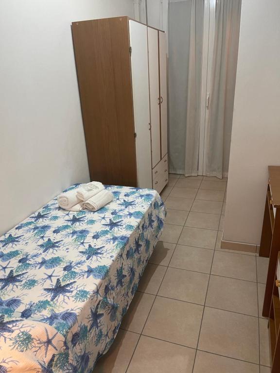 Postel nebo postele na pokoji v ubytování Hotel Vienna Rivazzurra