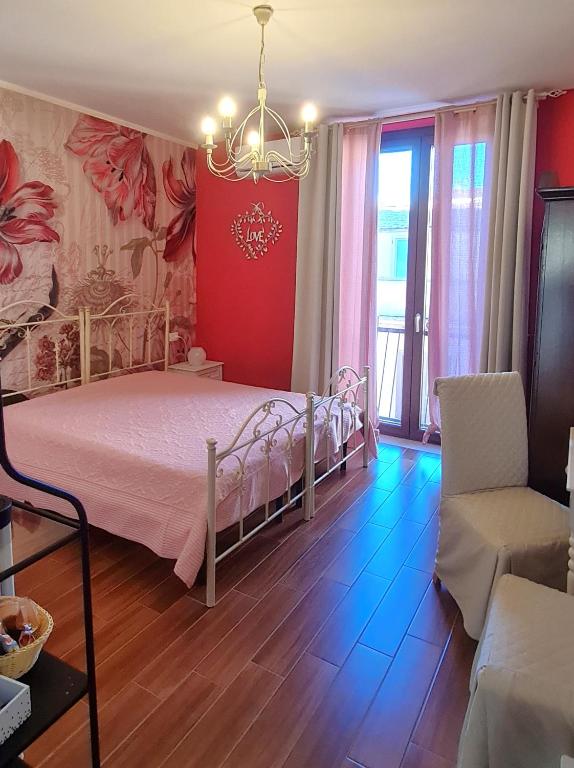 Postel nebo postele na pokoji v ubytování L'ISOLA AeR B&B