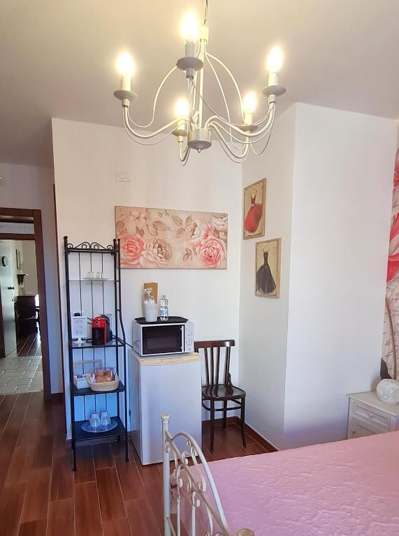 Kuchyň nebo kuchyňský kout v ubytování L'ISOLA AeR B&B