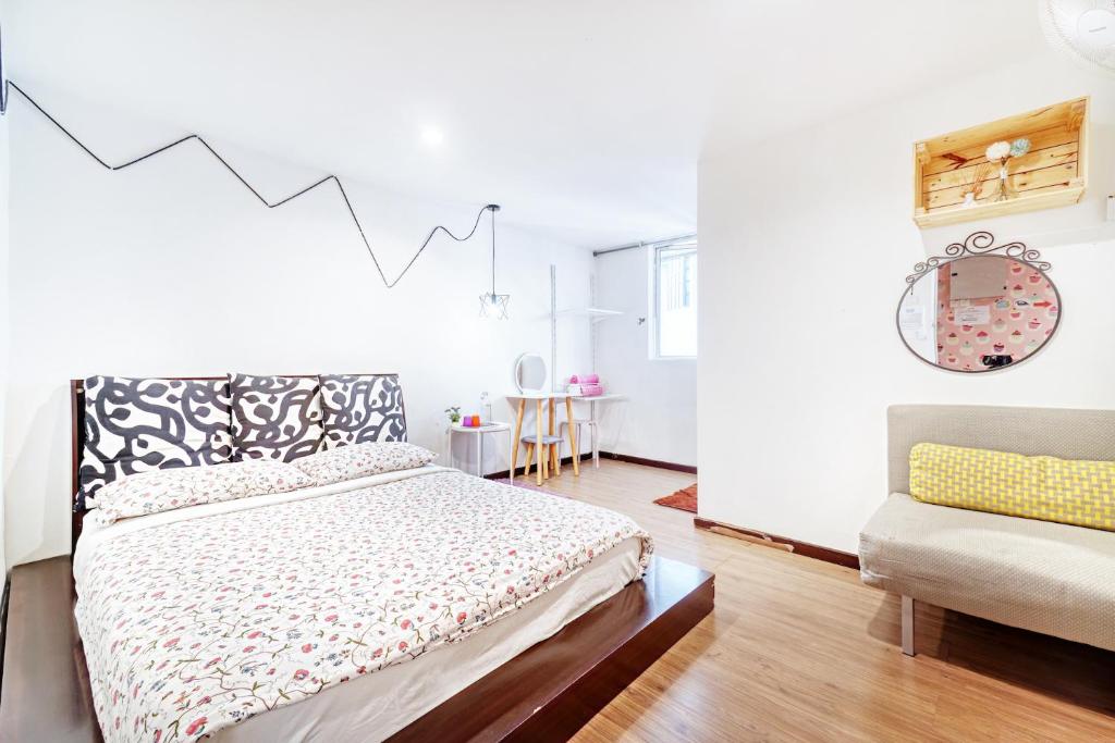 Postel nebo postele na pokoji v ubytování Snooze Hotel