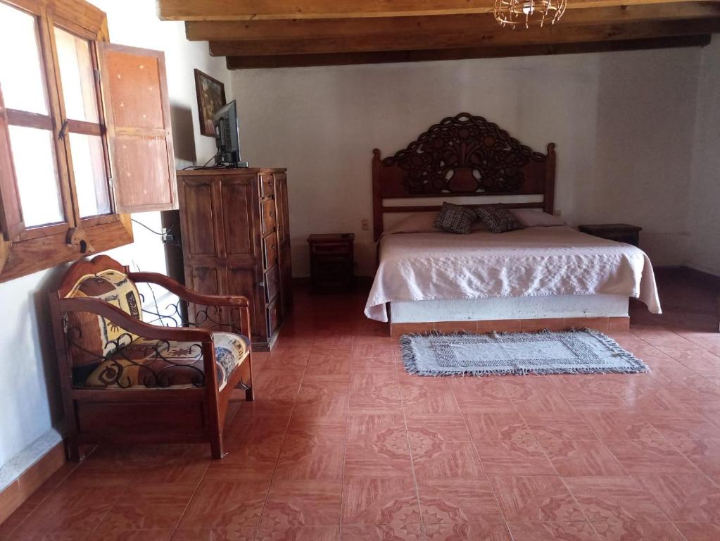 Postel nebo postele na pokoji v ubytování Hotel Cabañas Chalamu