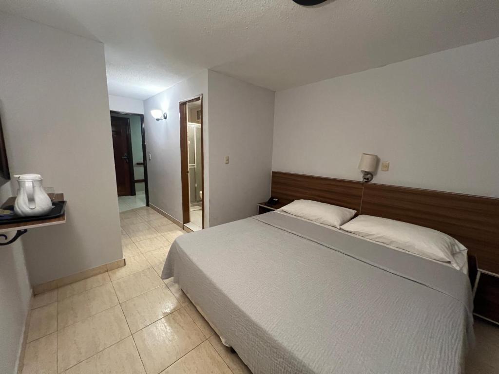 Postel nebo postele na pokoji v ubytování Eurohotel
