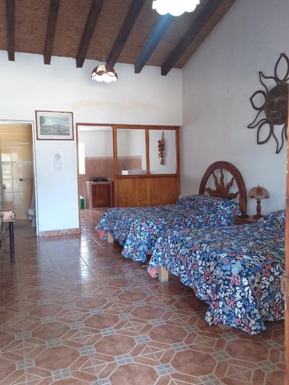Postel nebo postele na pokoji v ubytování Hotel Cabañas Chalamu