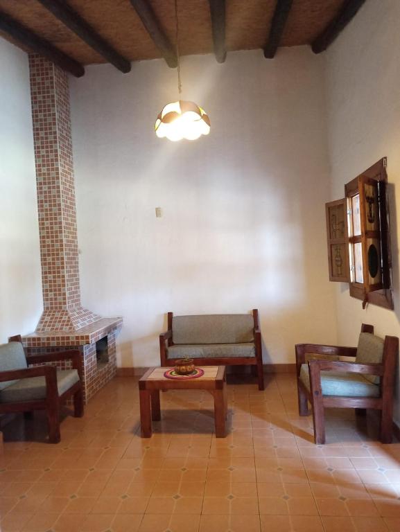 Posezení v ubytování Hotel Cabañas Chalamu