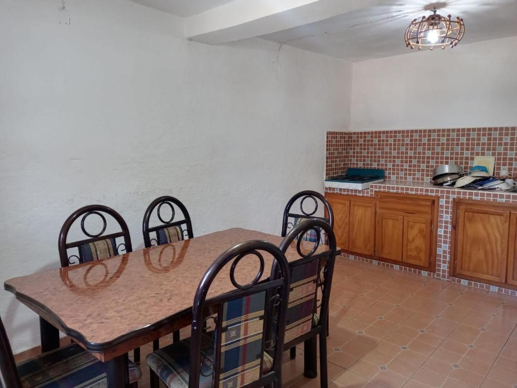 Kuchyň nebo kuchyňský kout v ubytování Hotel Cabañas Chalamu