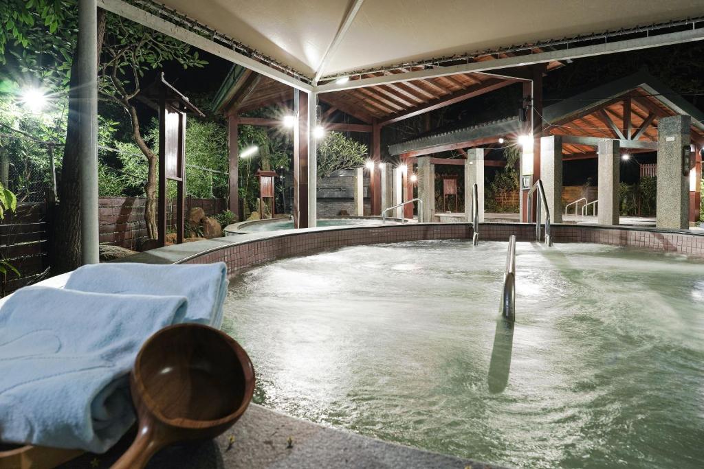 Bazén v ubytování Hoya Hot Springs Resort, Guanziling nebo v jeho okolí