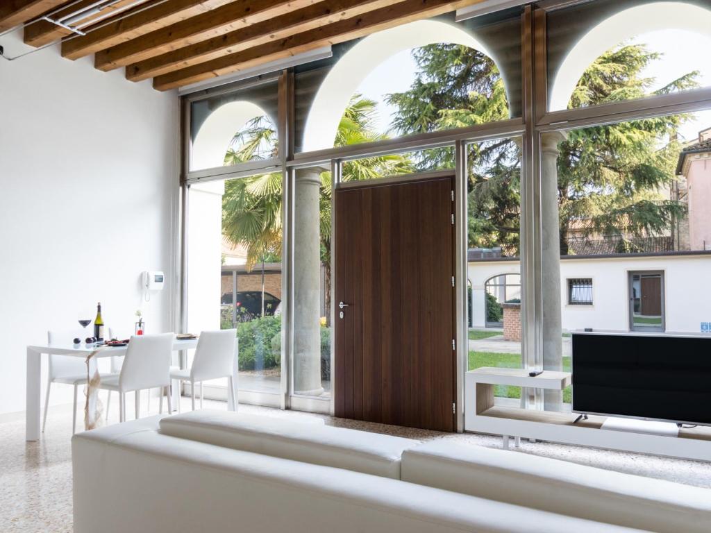 TV a/nebo společenská místnost v ubytování Residence Le Bugne