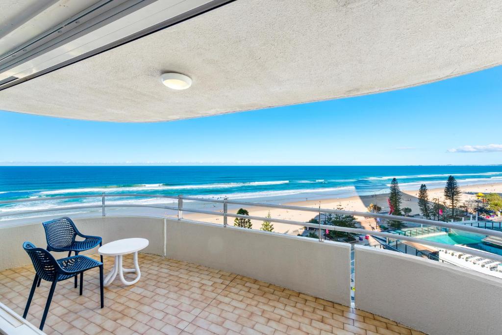 a balcony with a view of the beach and the ocean at Zenith Ocean Front Apartments Gold Coast - Official Listing in Gold Coast
