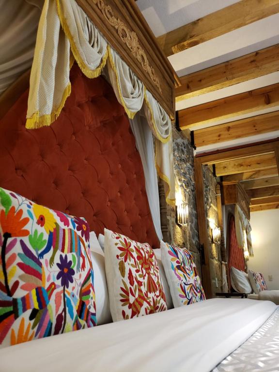 Кровать или кровати в номере Alborada Bernal