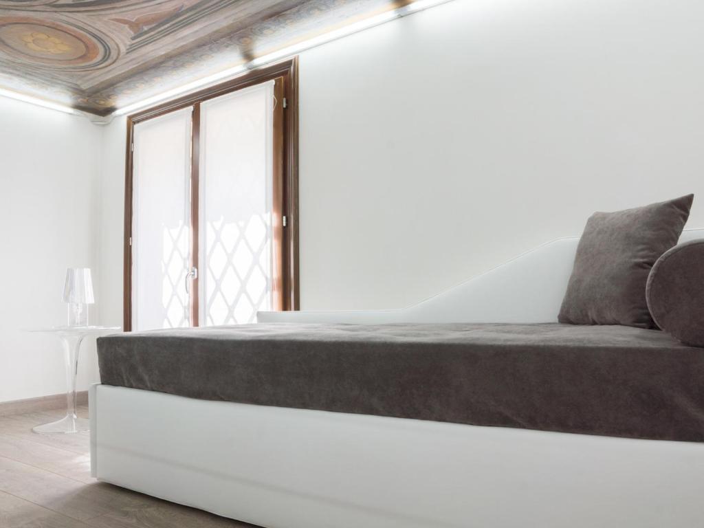 Postel nebo postele na pokoji v ubytování Residence Le Bugne