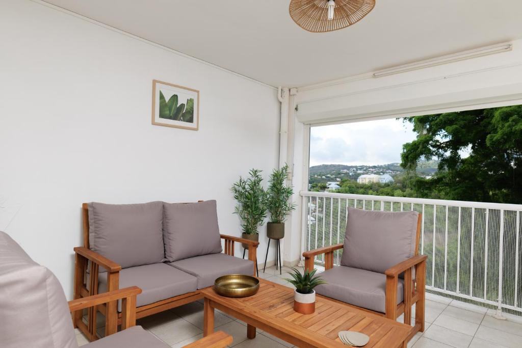 Balkón nebo terasa v ubytování Appart. T3 Les Hauts de Madiana