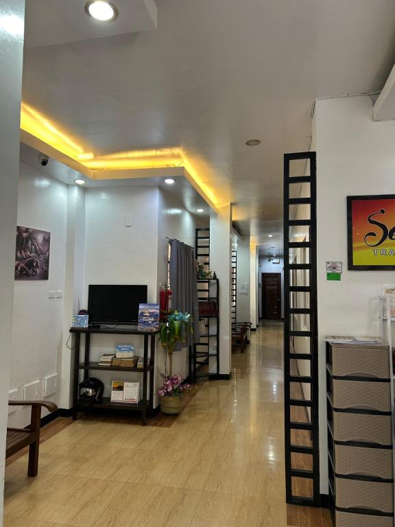 TV a/nebo společenská místnost v ubytování Seaslugs Travellers Inn