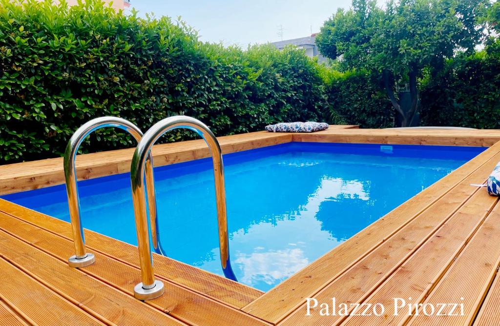 Bazén v ubytování Pompei Home Apartament nebo v jeho okolí