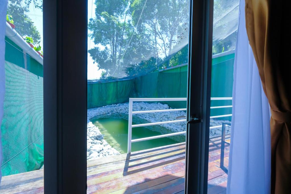 Fotografie z fotogalerie ubytování Woodcookies Guesthouse v destinaci Pangkor